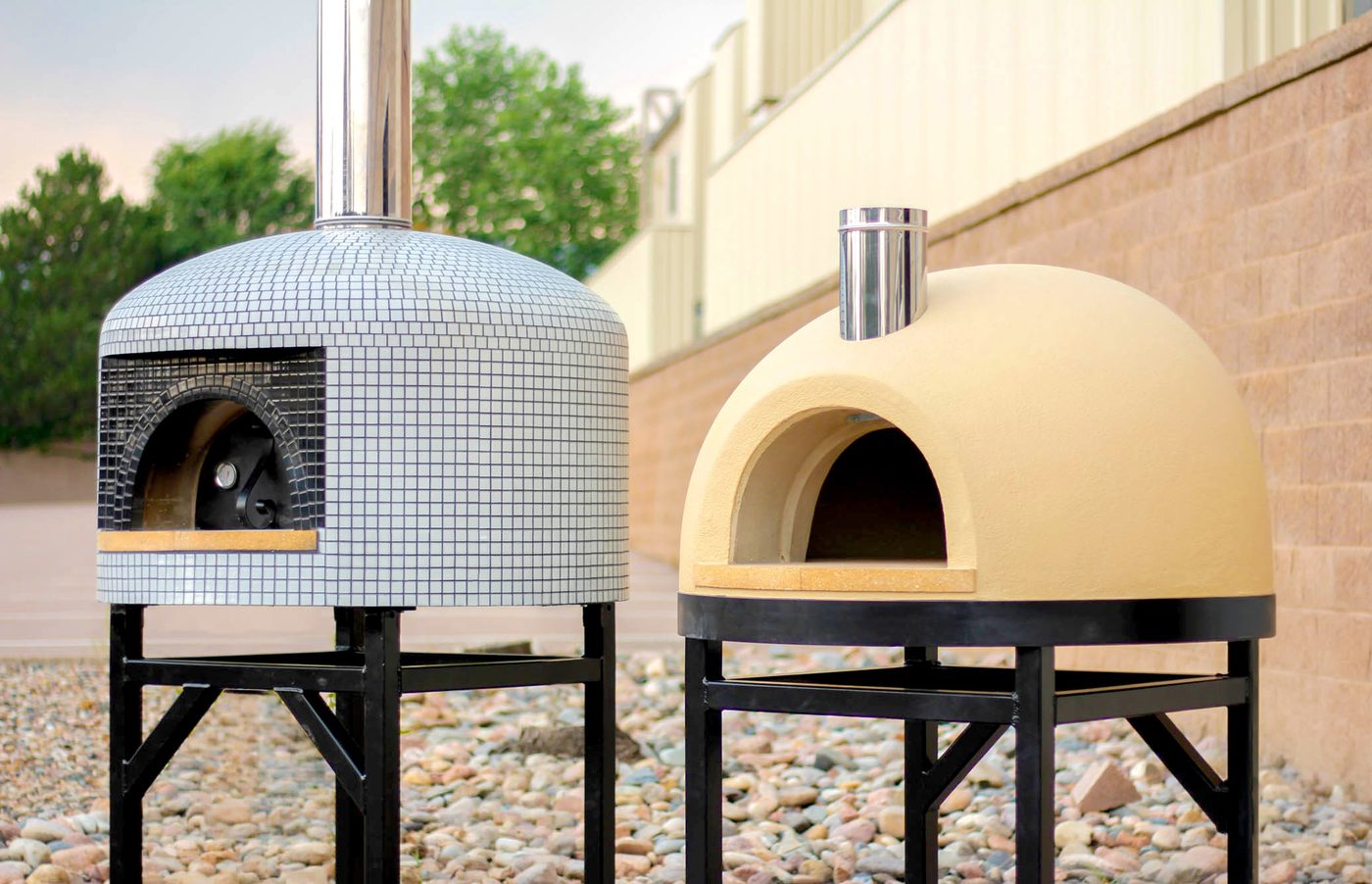 The Forno Bravo Napolino70 and Primavera70 wood-fired ovens outdoors